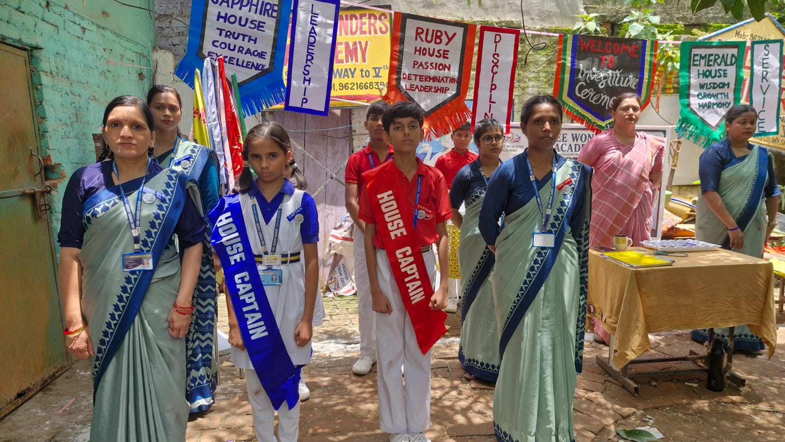 House captains and teachers at the investiture ceremony